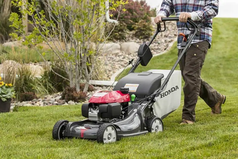 Self-propelled lawn mowers