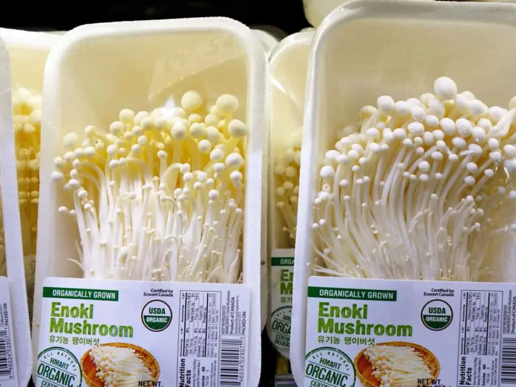 enoki mushrooms plastic wrapped