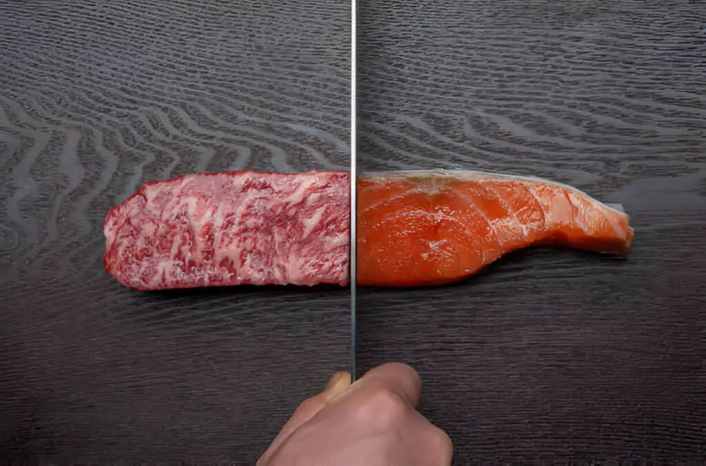 dividing the chunks of beef and salmon steak