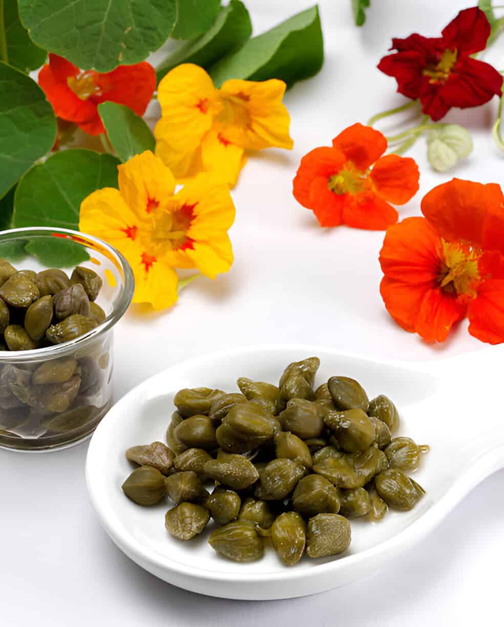 spoon of capers with flowers