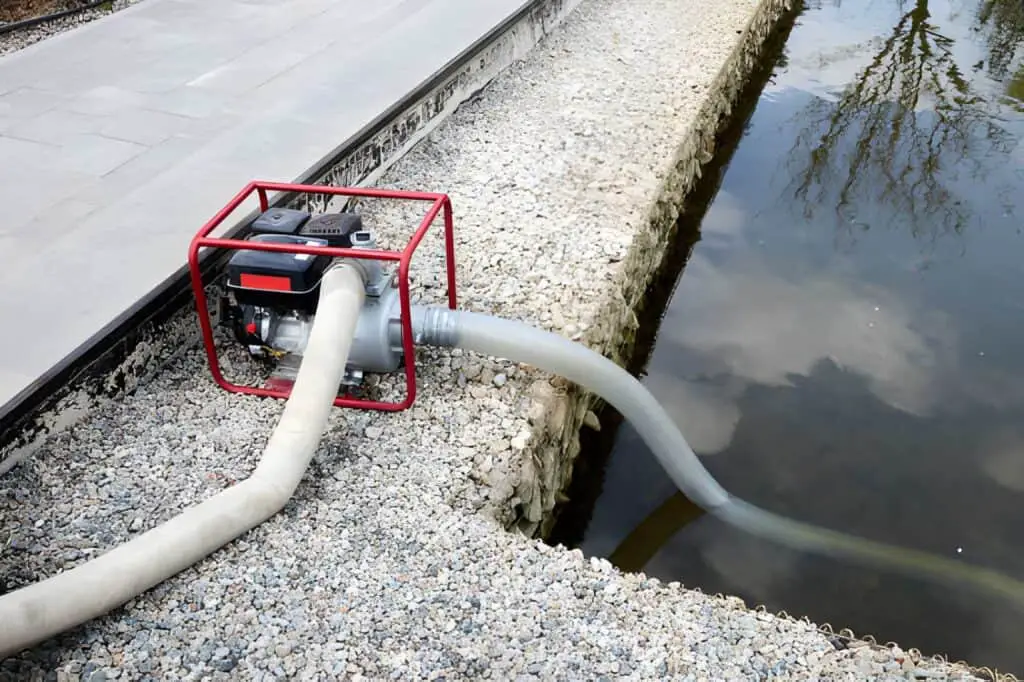 portable pump water-from-the-pond-for watering the garden